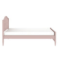 Pink solid-wood twin bed frame with scalloped headboard, turned legs and white mattress — children's bedroom furniture
