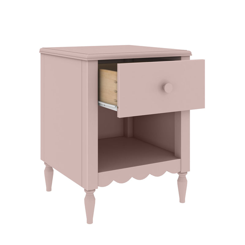 Blush pink wooden bedside table with open drawer, turned legs and lower storage cubby, vintage-style nightstand for nursery or bedroom