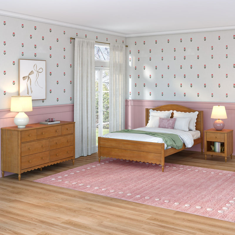 Cozy bedroom interior with pink tulip-pattern wallpaper, wooden bed and dresser, pastel pink rug, sheer curtains and bedside lamps