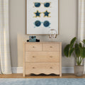 Light wood dresser with retro instant camera, gold headphone stand, framed sunglasses wall art, neutral plaid curtains and potted plant
