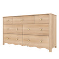 Light natural wood bedroom dresser with multiple drawers, round brass knobs and scalloped apron base — modern farmhouse storage chest