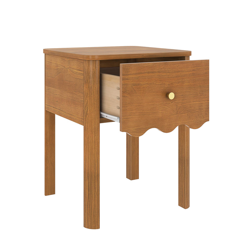 Warm oak wooden bedside table nightstand with single scalloped drawer, brass knob and tall legs for bedroom storage
