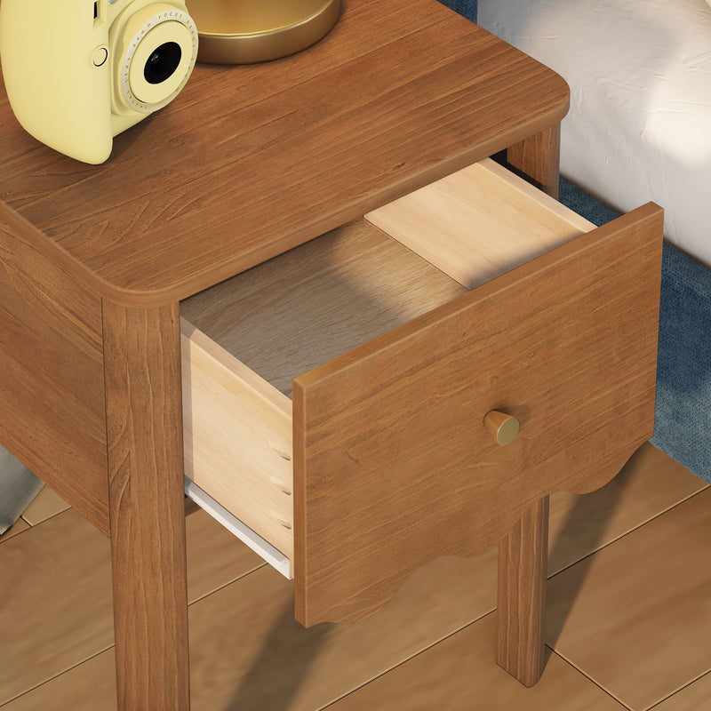 Mid-century modern oak bedside table with open drawer, brass knob and yellow instant camera on top, bedroom decor