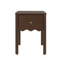 Dark walnut wooden nightstand bedside table with single drawer, brass knob, scalloped apron and four legs