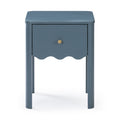 Blue wooden nightstand with single drawer and brass knob, scalloped apron and slim legs — modern bedroom side table