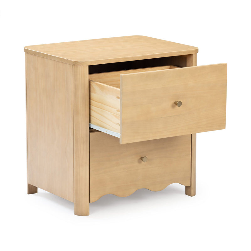 Light natural wood bedside nightstand with open drawer, brass knob, scalloped base and metal drawer slides — bedroom storage table