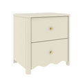 Cream two-drawer bedside nightstand with gold knobs and scalloped base, painted wood bedroom storage table