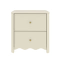 Cream two-drawer nightstand with brass knobs and scalloped base — compact bedside table for bedroom storage and décor.