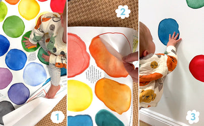Colorful watercolor peel-and-stick circle wall decals applied by a toddler — DIY nursery wall decor, easy removable kids' room decals