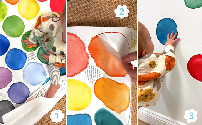 Colorful watercolor peel-and-stick circle wall decals applied by a toddler — DIY nursery wall decor, easy removable kids' room decals