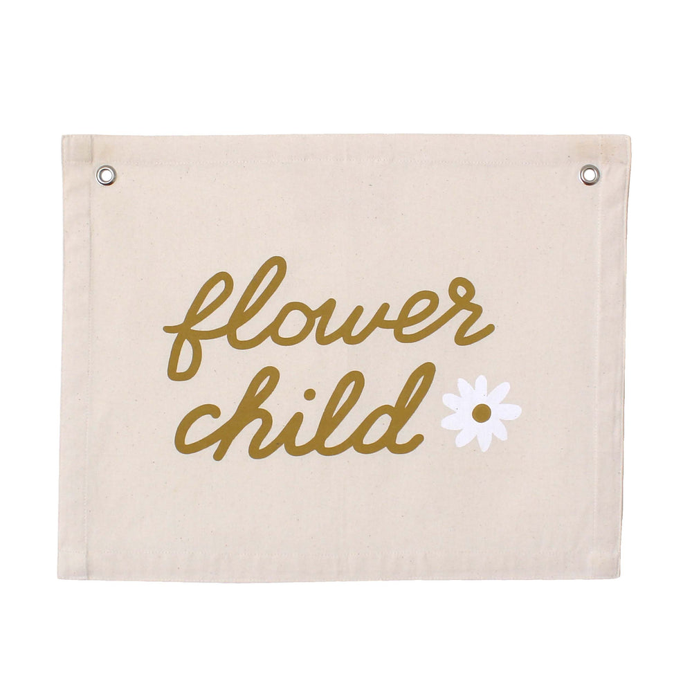Canvas banner with the phrase "flower child" in gold script next to a daisy flower graphic.
