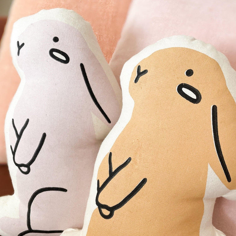 Cute pastel plush toys with simple design featuring abstract animal shapes, perfect for kids' bedroom decor.