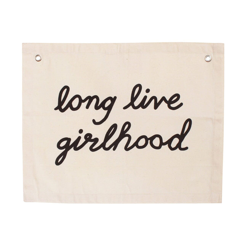Canvas banner with the phrase "long live girlhood" in black script text.