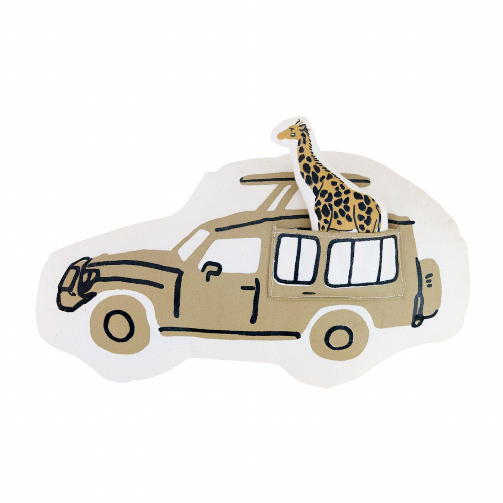 Safari-themed pillow with cartoon giraffe in jeep design.