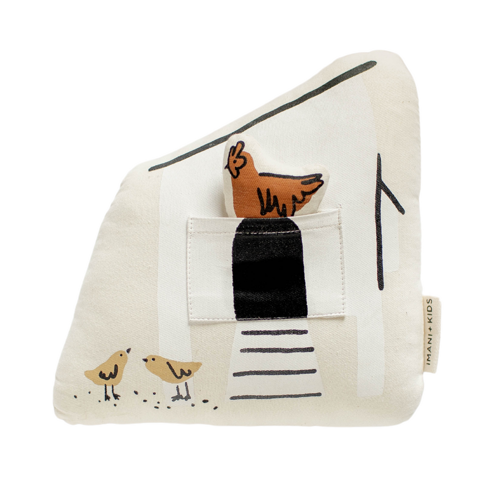Decorative children's pillow featuring chicken and chicks illustration by Imani+Kids.