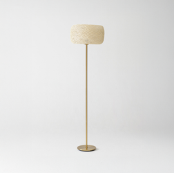 Tall modern floor lamp with beige woven lampshade and gold stand on white background.