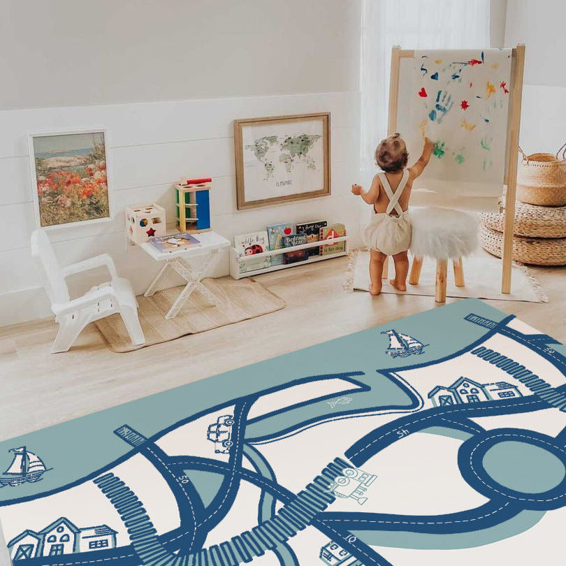 Toddler painting in a bright, Montessori-inspired playroom with educational toys and creative decor.