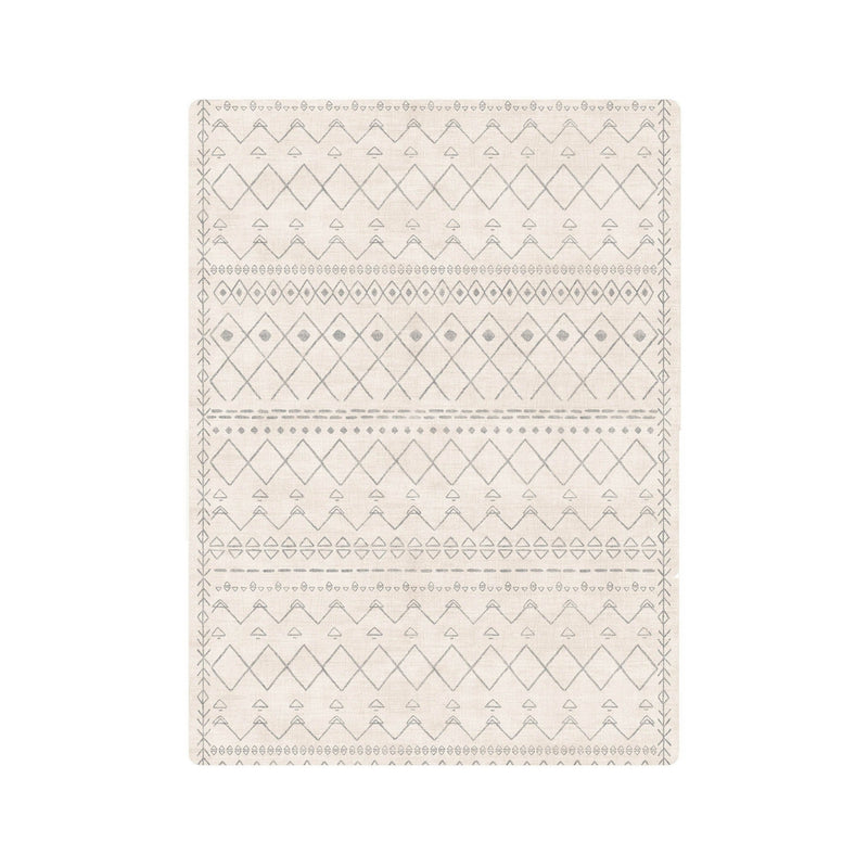 Beige area rug with geometric diamond patterns ideal for modern home decor.