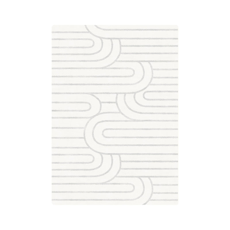 Modern white area rug with geometric pattern design.