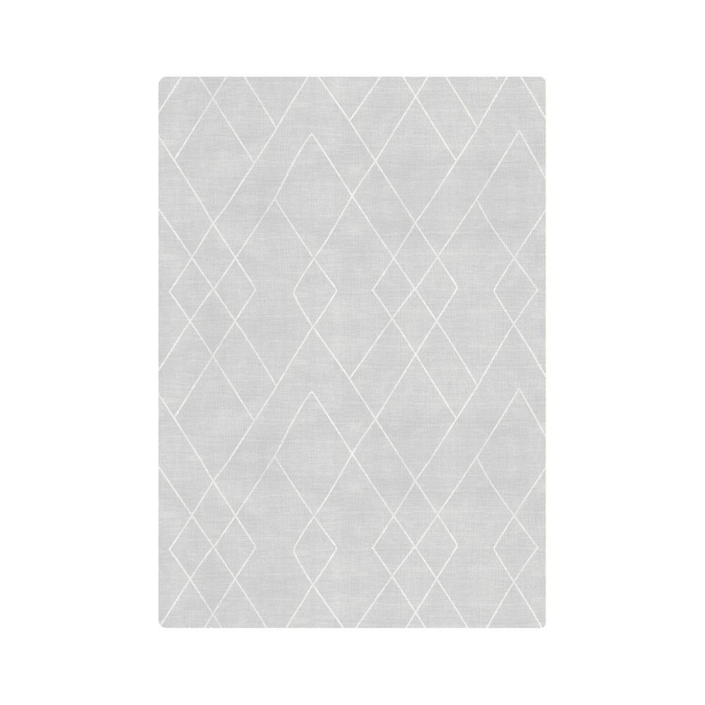 Modern gray area rug with geometric diamond pattern for contemporary home decor.