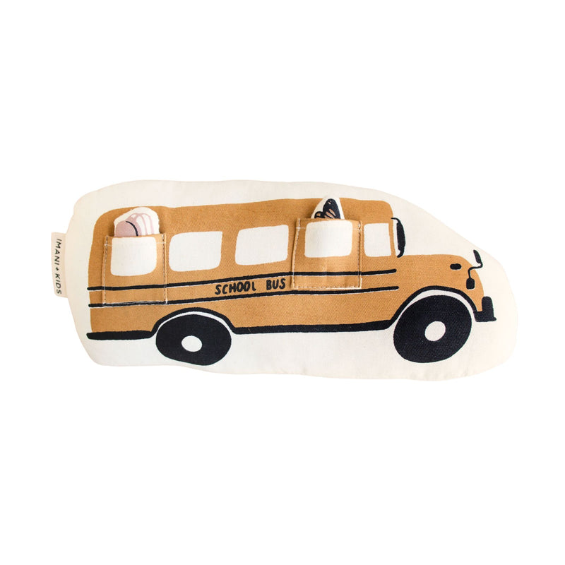 Stuffed yellow school bus toy with cutout windows, designed for children.