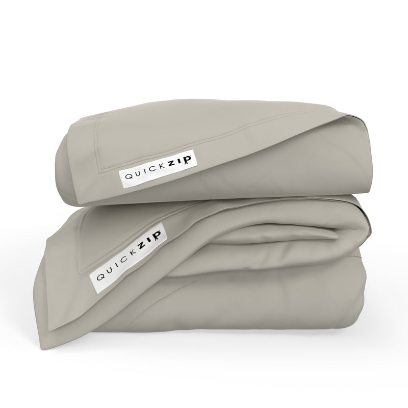 Stack of QuickZip Sheets in Light Gray Color for Easy Bed Making and Comfort