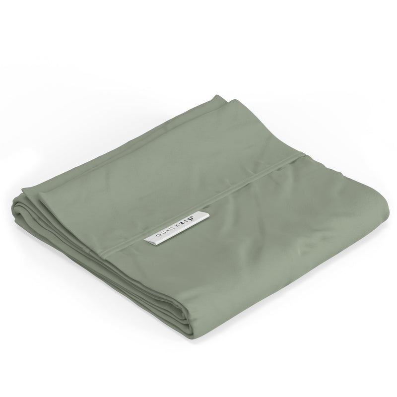 Folded green QuickZip fitted sheet, ideal for easy bed making and comfort.