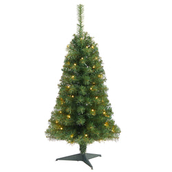 Pre-lit artificial slim Christmas tree with warm white LED lights on a plastic tripod stand — space-saving holiday decoration for small apartments and desktops