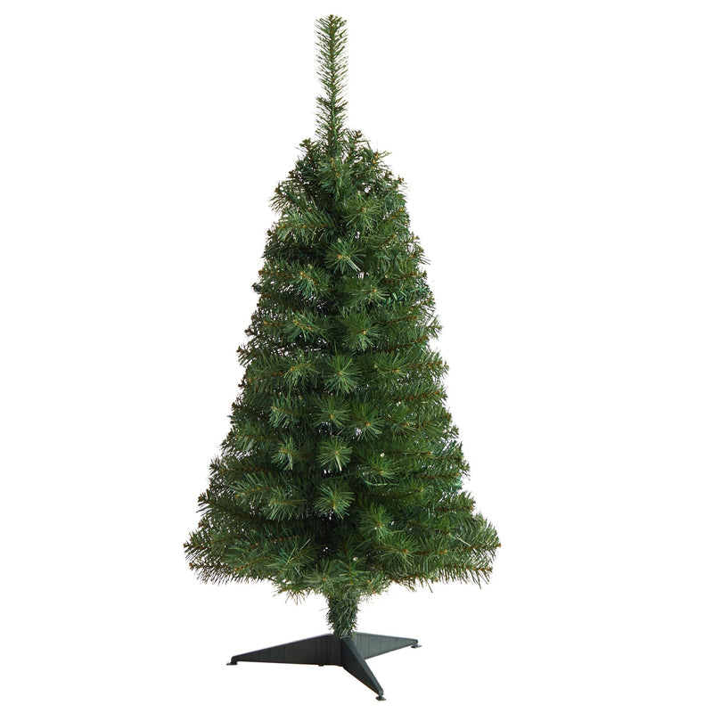 Slim artificial green Christmas tree with dense PVC needles on a black tripod stand — space-saving holiday decoration for small rooms and apartments
