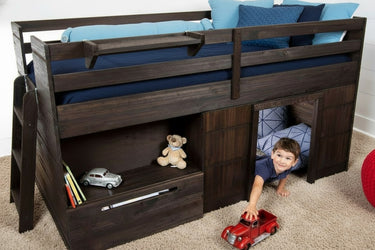 Children's wooden low loft bed with toys and a child playing underneath.