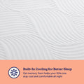 Cooling gel memory foam baby mattress close-up with white quilted cover and peach label reading "Built-In Cooling for Better Sleep," highlighting breathable, temperature-regulating toddler mattress