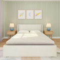 Bright children's bedroom with white upholstered bed and mattress, green vertical-striped wallpaper, wooden nightstands with blue table lamps, and framed rocket, moon and star wall art
