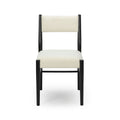 Modern dining chair front view with black wood frame, cream textured upholstered seat and backrest on white background