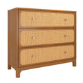 Mid-century modern three-drawer wooden dresser with woven rattan cane drawer fronts and round brass knobs in warm teak finish