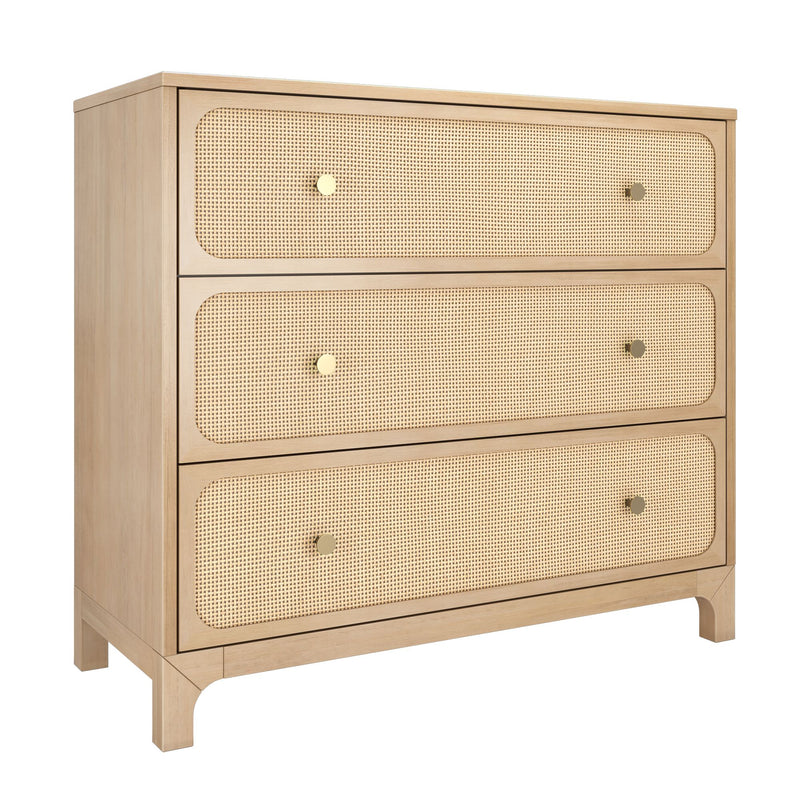 Mid-century modern three-drawer natural oak dresser with woven cane rattan drawer fronts and brass knobs, light wood bedroom storage