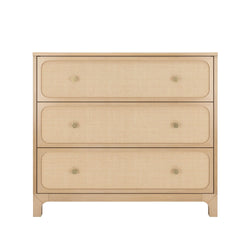 Light wood three-drawer dresser with natural cane rattan fronts and brass knobs, mid-century modern bedroom storage