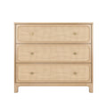 Light wood three-drawer dresser with woven cane rattan drawer fronts and brass knobs — mid-century modern Scandinavian bedroom storage