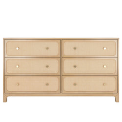 Light wood six-drawer dresser with woven rattan cane drawer fronts and brass knobs — mid-century modern boho bedroom storage chest