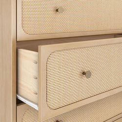 Light wood mid-century modern dresser with woven rattan (cane) drawer fronts, brass knobs and a partially open drawer showing dovetail joints.