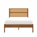 Mid-century modern wood platform bed with woven rattan cane headboard and white mattress in warm walnut finish, minimalist bedroom furniture
