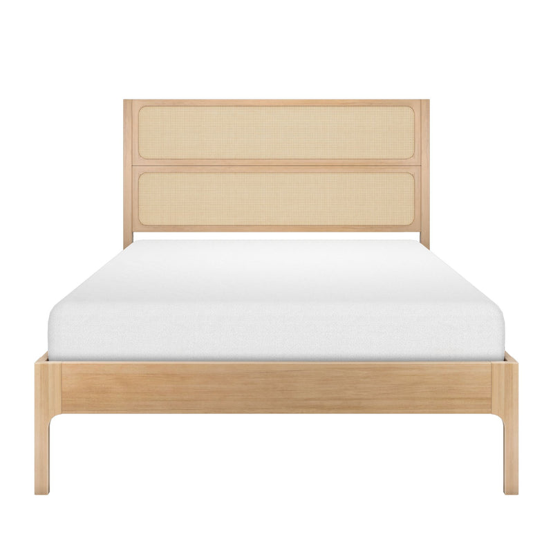 Natural oak platform bed with woven rattan cane headboard and white mattress — minimalist modern Scandinavian bedroom furniture