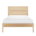 Light wood platform bed with woven rattan cane headboard and white mattress, minimalist Scandinavian bedroom furniture