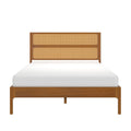 Mid-century modern wooden platform bed with woven cane rattan headboard, warm wood finish and white mattress, minimalist bedroom furniture