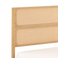 Natural light wood headboard with woven cane rattan panel, mid-century modern bed headboard detail and mattress edge on white background