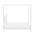 White modern four-poster canopy bed frame with low platform mattress, minimalist contemporary bedroom furniture on white background
