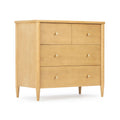 Light maple mid-century modern 4-drawer dresser with tapered legs and round brass knobs, minimalist wooden chest for bedroom or nursery