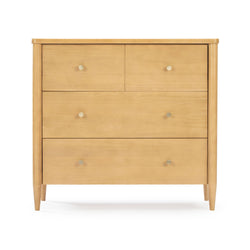 Mid-century modern light wood 3-drawer dresser with tapered legs and round metal knobs, natural maple-finish chest of drawers on white background