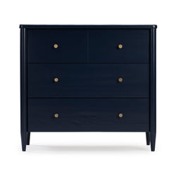 Mid-century modern navy blue four-drawer wood dresser with round brass knobs and tapered legs for bedroom storage