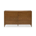 Mid-century modern six-drawer wooden dresser in warm walnut finish with round brass knobs and tapered legs, ideal for bedroom storage