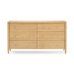 Six-drawer light wood dresser with tapered legs and round brass knobs, Scandinavian mid-century modern bedroom storage